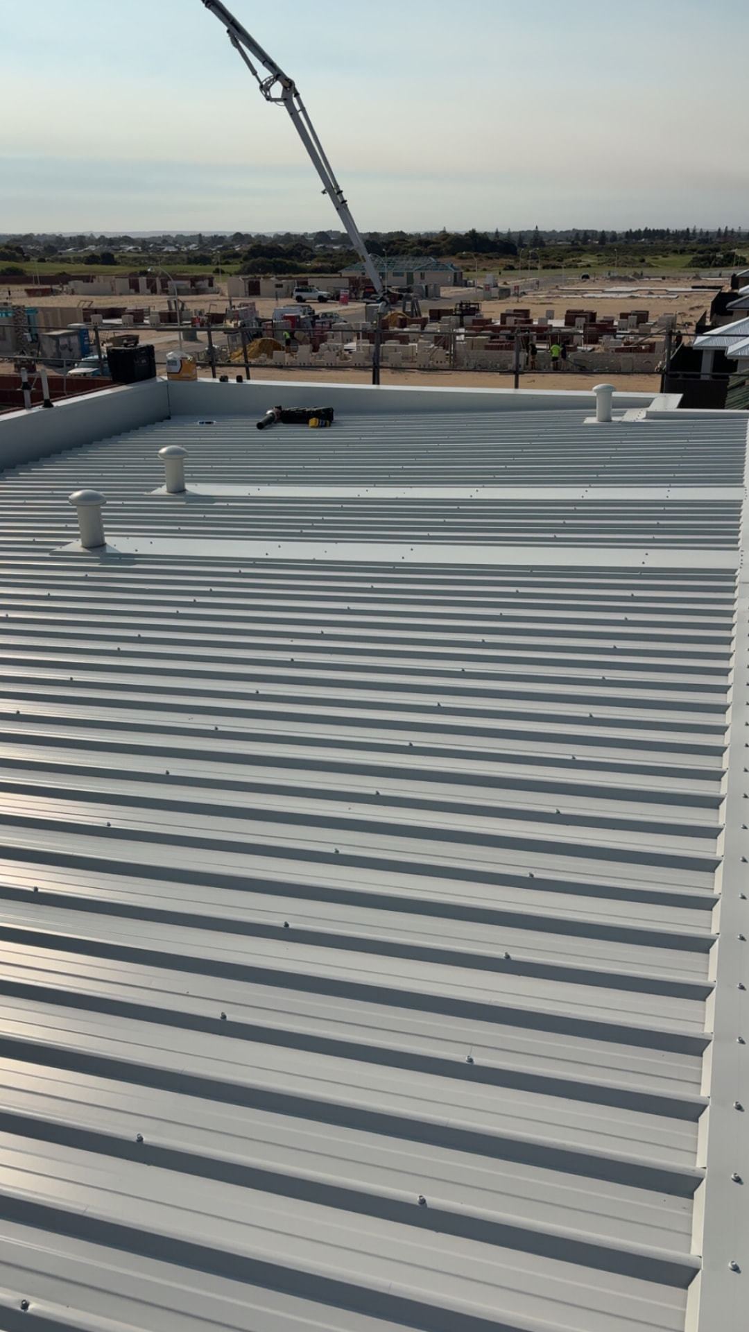 Newly installed Colorbond metal roof with vents